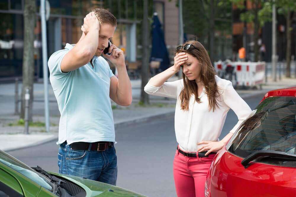 Lady driver of the rental car worried on the collision.